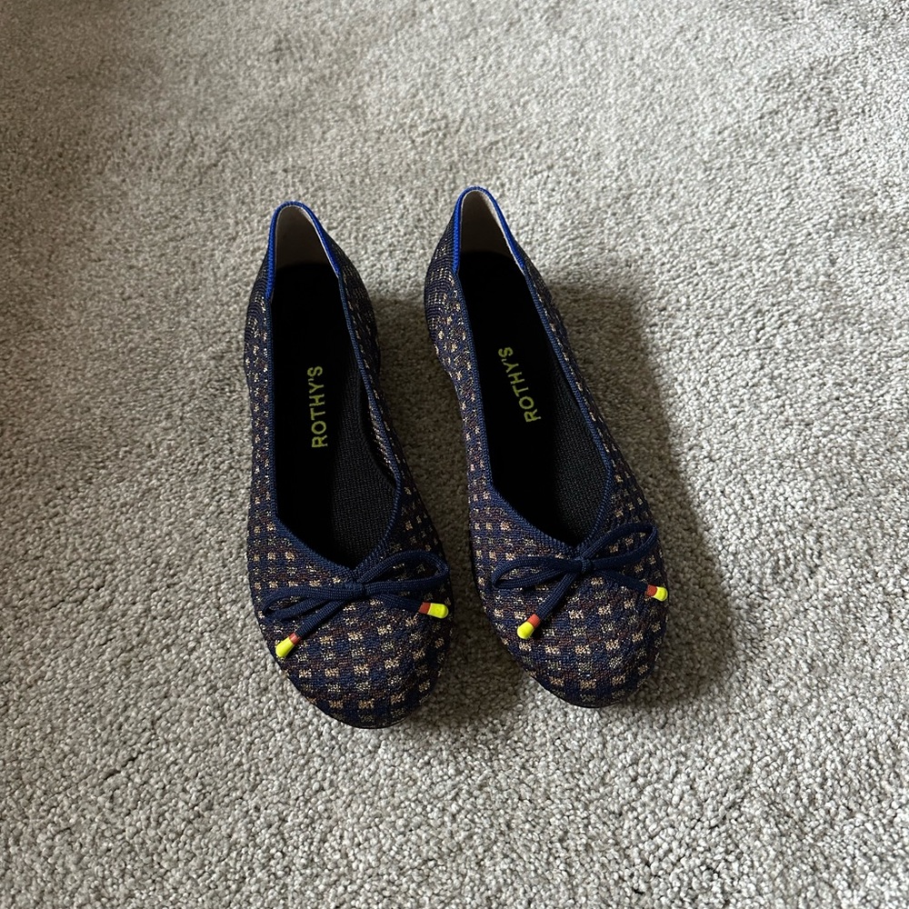 Navy and gold Rothy’s